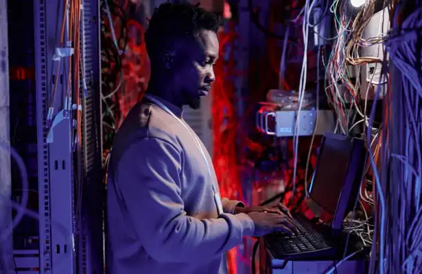 network-administrator-setting-up-servers-and-using